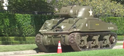 Illustration for article titled Homeowners' Association Is Very Upset About Man's WWII Tank But They’re Welcome To Try And Tow It